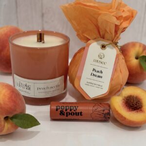 Peach-scented candle, wrapped soap, lip balm
